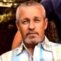 Michael E. "Mike" Milstead