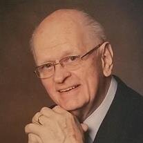 Earl L. Kumm