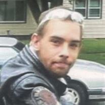 Travis E. Abben