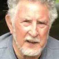 Carlos "Tom" Brewer