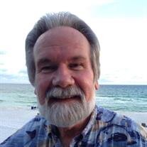 JOHNNIE "JOHN" E. NOE