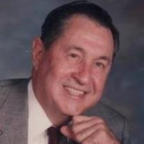 Neil J Baudin