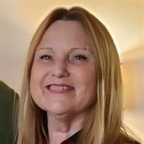 Laura L Luster