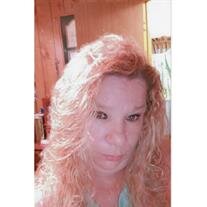 Cynthia J. "Cyndi" Miller