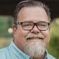 James E. "Jim" Manes