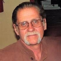 Michael R. Miller (aka "Mike" or "Griz")