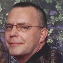 Kim J. Riggs