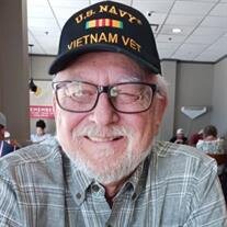 Raymond J. Arcement