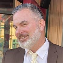Mark M Sarvis