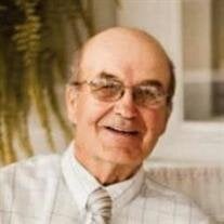 Tommy F. "Tom" Nesius
