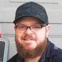 Aaron E. Mills