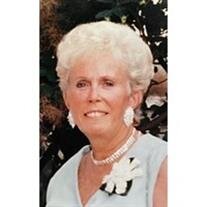E. Deva Mills