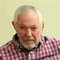 Dennis A White