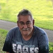 John M. Commero