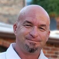 Charles E. "Chuck" Kelly
