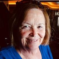 Tina M. Lewis