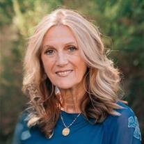 Ms. Adriana "Jeannette" Van Ballegooyen