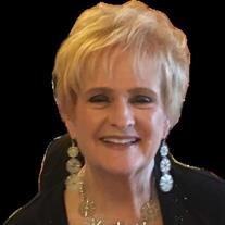 Catherine M Wood