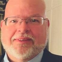 Mark E. Bowen