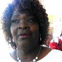 Ms. Gloris Ann Moore