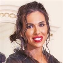 Tania Marie Caringi