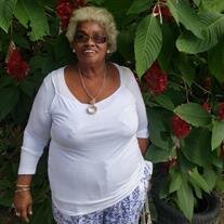 Joan Aneitha Stephenson-Scarlett (Ms. Joan)