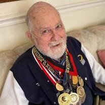 "Ted" James G. Kezos