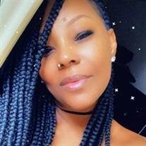 Ms. Mayoshcharvon "CHE" Woodard