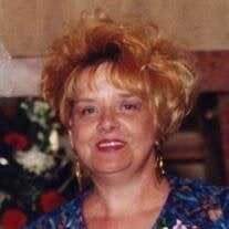Sarah E. Cooper