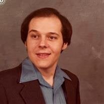 Charles M. "MIKE" Simmons