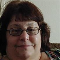 Louise Caravia-Groves