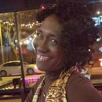 Ms. Thela Truenell Elliott