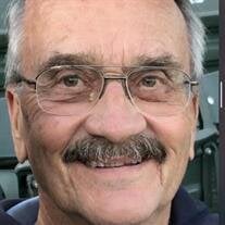 Mark E. Lewis