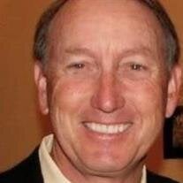 Tom E. Ness