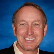 Tom E. Ness