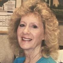 D. Louise Cross