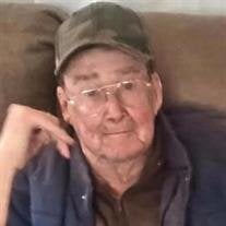 Tom John "T.J." Cox