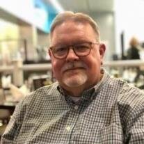 Kevin L. David