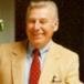 JOHN E. WOODWARD