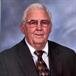 B. J. Coker