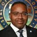 The Honorable Commissioner Dennis Deer