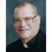 Rev. Denis E. White
